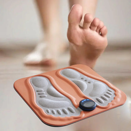 Orange foot massager mat with gray contoured pads and digital control, for relaxation and foot care