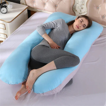 Light blue U-shaped pregnancy body pillow for side sleeping support, cradles belly and back
