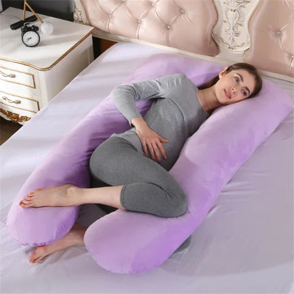 Purple U-shaped pregnancy body pillow for side sleeping support, cradling belly and legs