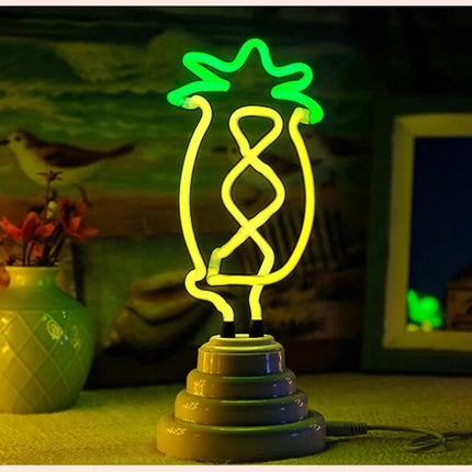 Green and yellow neon pineapple lamp with twisted design, colorful base, tropical decor accent