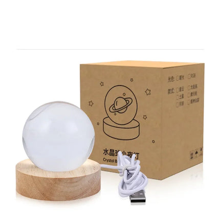White crystal ball night light with wooden base, USB cable, and planet design box