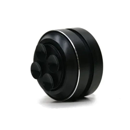 Black facial massager with 4 silicone nodes, sleek design for skincare and relaxation