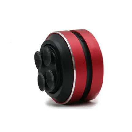 Red and black smart home gadget with circular design and four buttons