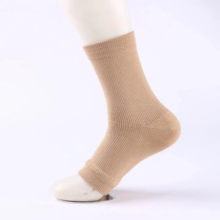 Beige ribbed ankle sock with snug fit, ideal for comfort and everyday wear