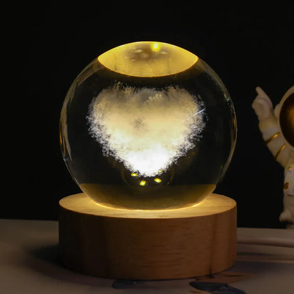 Glowing heart-shaped crystal ball lamp with wooden base, warm LED lighting for cozy ambiance