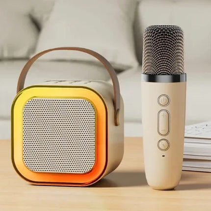 Portable yellow speaker with handle and beige karaoke microphone for home entertainment