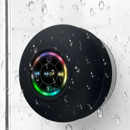 Black waterproof shower speaker with rainbow LED controls and suction mount