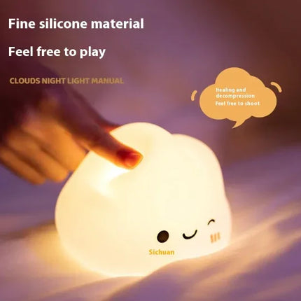 Soft silicone cloud night light with cute face, emits warm glow for healing ambiance