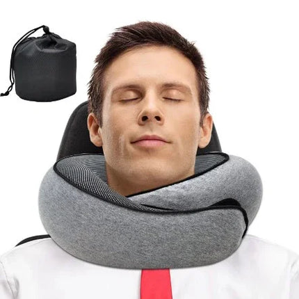 Gray memory foam travel neck pillow with black trim, shown with carrying bag for comfort and portability.