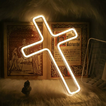 Glowing white neon cross light with clear acrylic frame, modern wall decor for bedroom or altar space