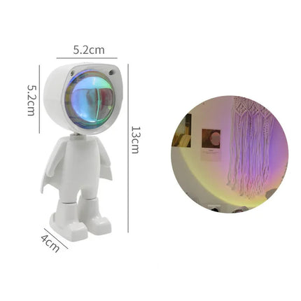 White astronaut-shaped projector with rainbow LED light, 13cm tall, for ambient room decor