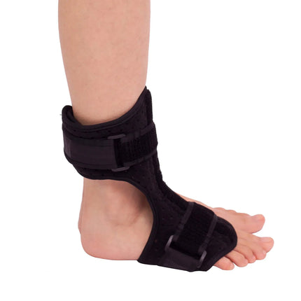 Black adjustable ankle brace with breathable perforated design and secure straps for support