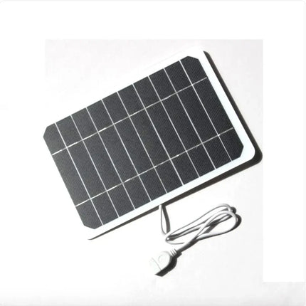 Compact solar panel with white frame and USB cable, black photovoltaic cells for portable charging