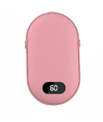 Pink oval portable hand warmer with digital display showing 60 degrees