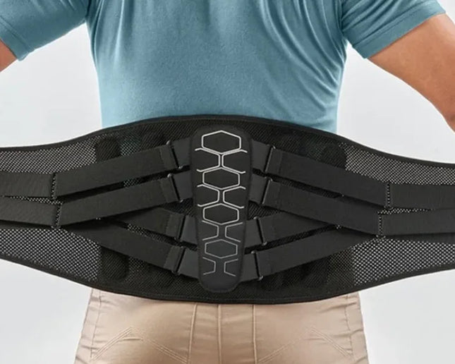 Black back brace with hexagonal design, adjustable straps for lumbar support and posture correction