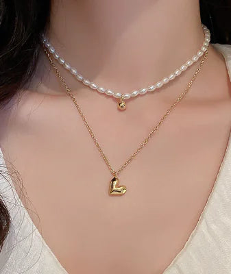Heavenly pearl necklace single piece elegant women’s jewelry

Front View / Full Necklace:

Single pearl necklace with minimalist and classy design for women

Close-Up of Pearl Pendant:

Elegant pearl pendant detail on women’s single piece necklace

Chain / Clasp Detail:

Delicate chain with secure clasp on heavenly pearl necklace

Model Wearing Necklace:

Women wearing single pearl necklace for everyday and formal outfits

Packaging / Gift Box Display:

Single piece pearl necklace in jewelry gift box for wo