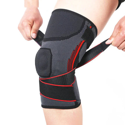 Black and red knee brace with adjustable straps for support and compression during sports or recovery