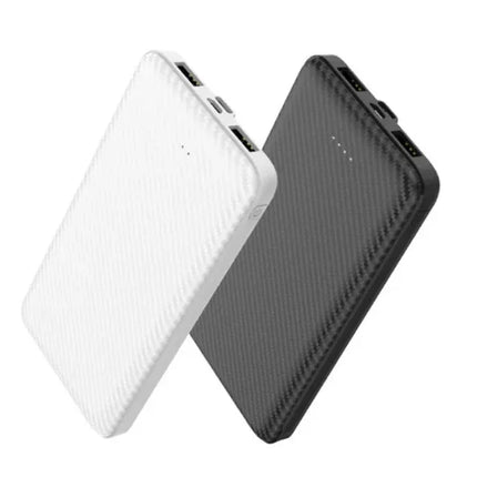 White and black portable power banks with carbon fiber texture, dual USB ports, LED indicators for charging status