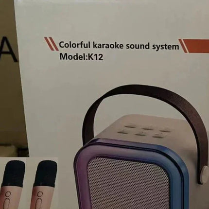 Colorful karaoke sound system K12 with dual mics, purple-blue design, and portable handle for entertainment.