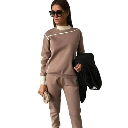 Women wearing color block knitwear set with long sleeve top and straight pants in casual style