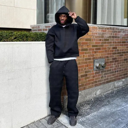 Loose-fit streetwear hoodie and sweatpants set in solid colors