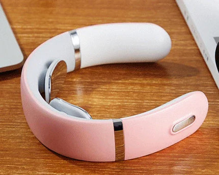 Pink and white neck massager with silver accents, designed for relaxation and muscle relief