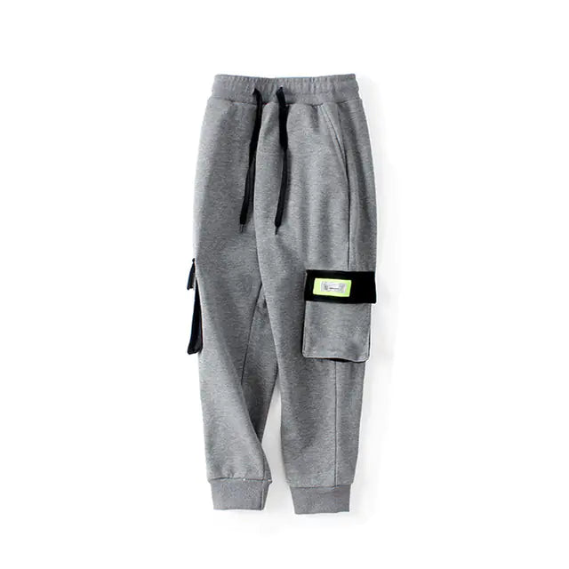 “Kids cotton sports pants with pockets in beige black and blue”